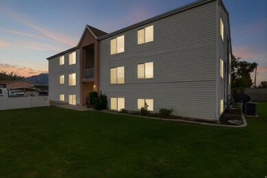View of front of building at dusk