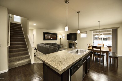 A Kitchen and Living