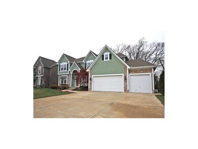 Stucco and stone front with great 3 car garage.