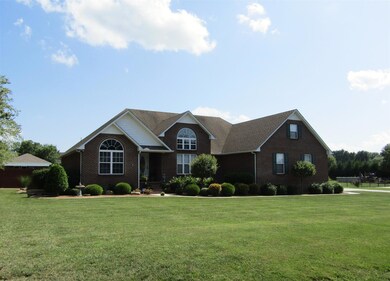View of home and pool house from Courtnea Lane.