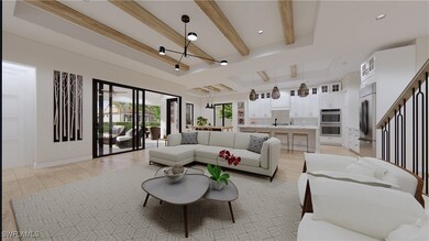 Living room featuring beam ceiling, light hardwood
