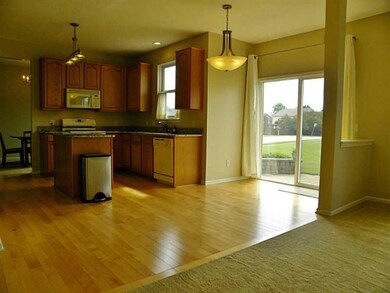 Breakfast Area/Room. Roomy breakfast area and kitchen with hardwood floors.