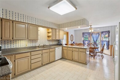 Large kitchen with granite countertops and spacious dining areas for your everyday meals.