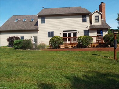 Rear view of the house with deck