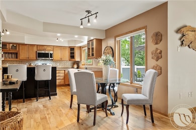 Open to kitchen and island.