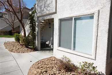 Entrance to property featuring stucco siding and c