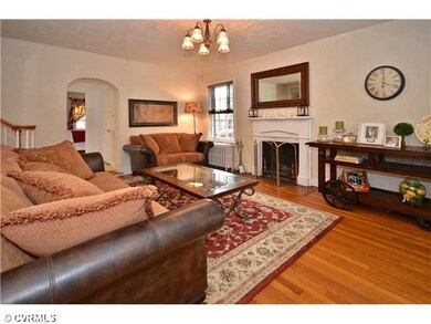 Living Room - Beautiful hardwood floors and a wood