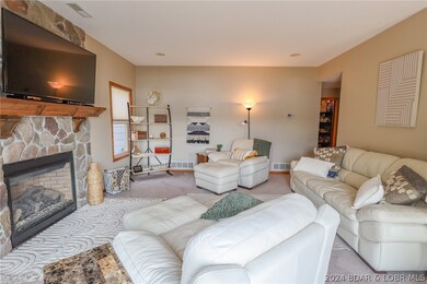 Cozy living room area with gas fireplace

