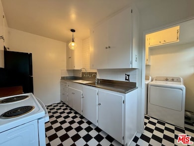 5560 Village Green, Los Angeles, CA 90016 - photo 2