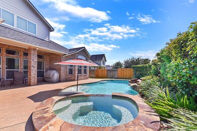 Nice view of the covered porch and spa.