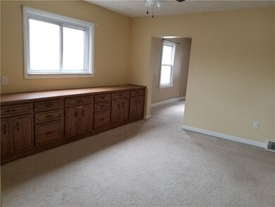 View of the Dining Room from the Kitchen. There is