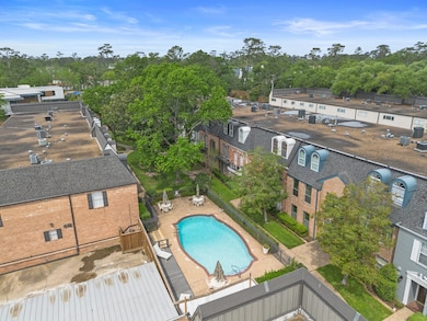 Aerial view of the community pool nestled between
