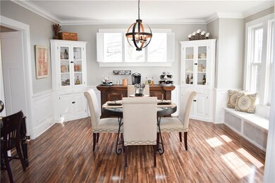 Magazine quality dining room features custom corne