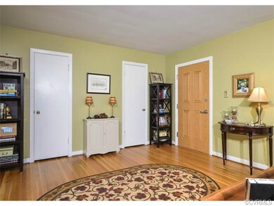 The living room has a brand new interior wood door