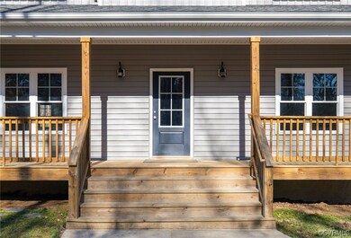 Property entrance with a porch