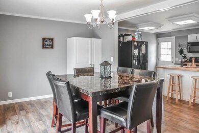 The dining room has a pantry and opens to the kitc