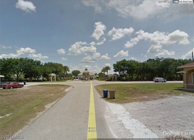 Standing near lot and straight ahead is the entrance to Westminister Golf Course