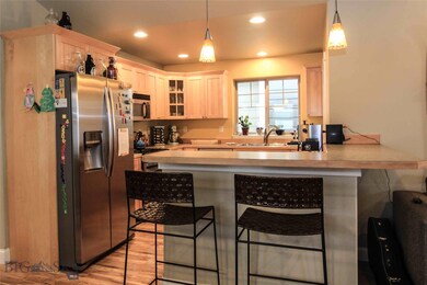 Kitchen with dining bar and updated stainless appl