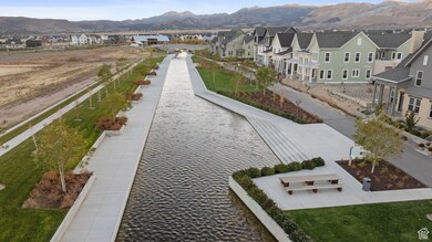 Aerial perspective of suburban area with a mountain backdrop