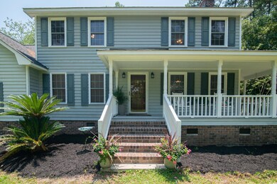 Colonial-style house with a porch