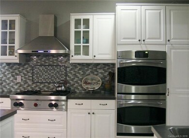 Wolf Gas Range and Stainless Steel Double Ovens