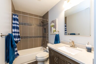 Bathroom on main level, updated with stylish tile 