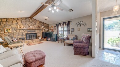 Huge fireplace wall with large hearth.
