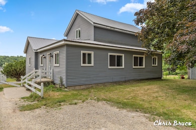 465 W Pleasant St, Hubbardston, MI 48845 - photo 2