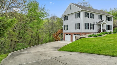 Nice 2 Car Garage with Concrete Driveway