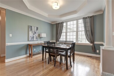 Dining space featuring light hardwood / wood-style