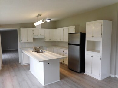 Great inviting Kitchen with an Island.