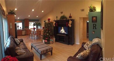 Welcoming Living room open to Kitchen