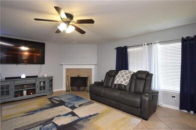 DEN HAS TILED FLOORING AND LOTS OF NATURAL LIGHT