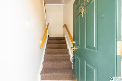 ENTRANCE TO 2ND FLOOR CONDO!