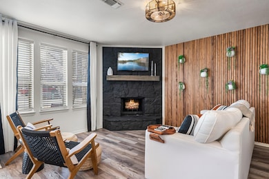 Living area with visible vents, plenty of natural
