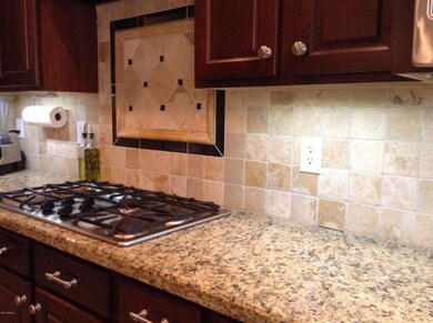 Granite countertops, tile backsplash