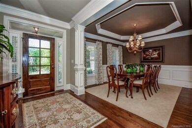 Generous formal Dining Room with double tray ceili