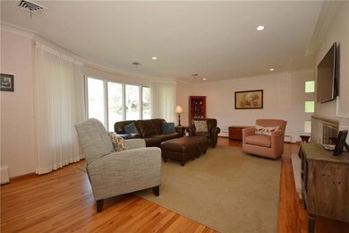 Bright and sunlit, this spacious living room will 