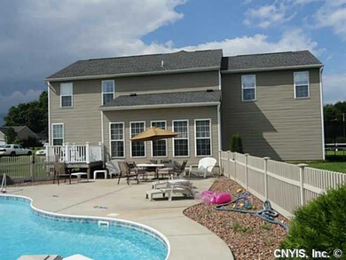 Exterior Back. The landscaping is immaculate. The 