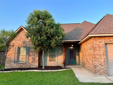 View of front of home featuring a front yard and a