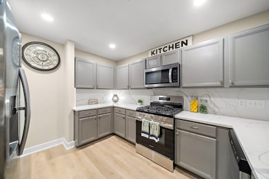 Lots of counter space here.  Plenty of cabinets fo