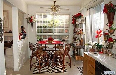 Dining area off kitchen opens to private back yard