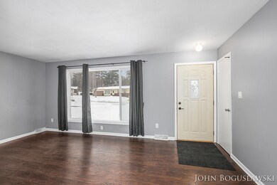 1498 Cloverly Ct NW, Grand Rapids, MI 49544 - photo 2