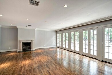 Freshly painted LIVING ROOM has wood burning firep