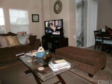 Living room open to kitchen and dining room