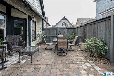 PATIO AREA IN FENCED BACK YARD ACCESSED THROUGH GR