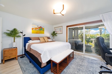 The owners suite has a closet, king sized bed and workstation, along with its own private lanai.