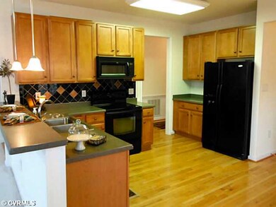 Kitchen - Large eat-in kitchen with raised height 