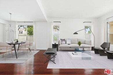 FORMAL LIVING ROOM/DINING AREA/VIRT STAGED