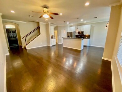 Unfurnished living room with baseboards, recessed